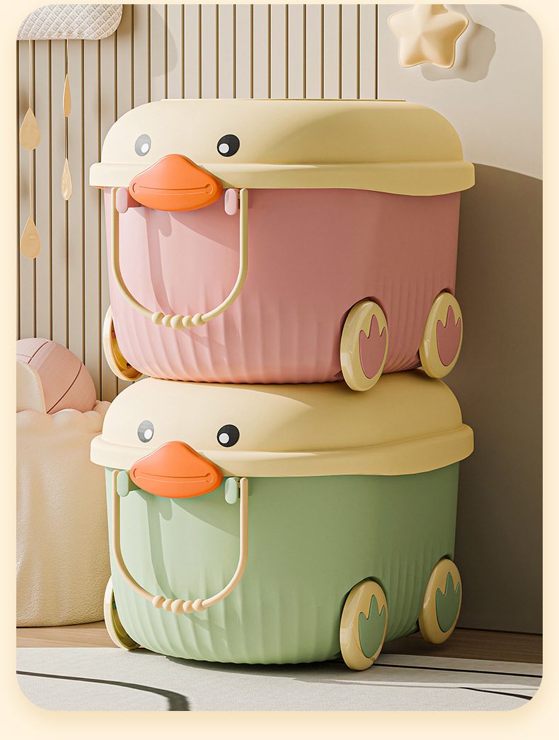 Pink and green duck storage boxes stacked